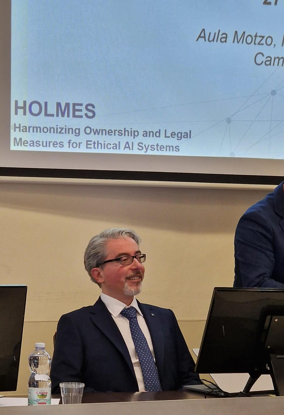 Simone Dongu presenting Scientific Research on Generative AI at the HOLMES conference at UNICA, Cagliari 2025 Simone Dongu presenting Scientific Research on Generative AI at the HOLMES conference at UNICA, Cagliari 2025