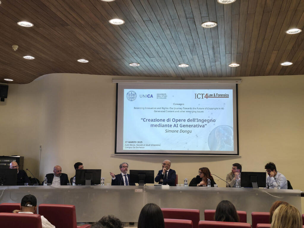 Simone Dongu presenting academic research at the HOLMES conference at UNICA, Cagliari, 2025