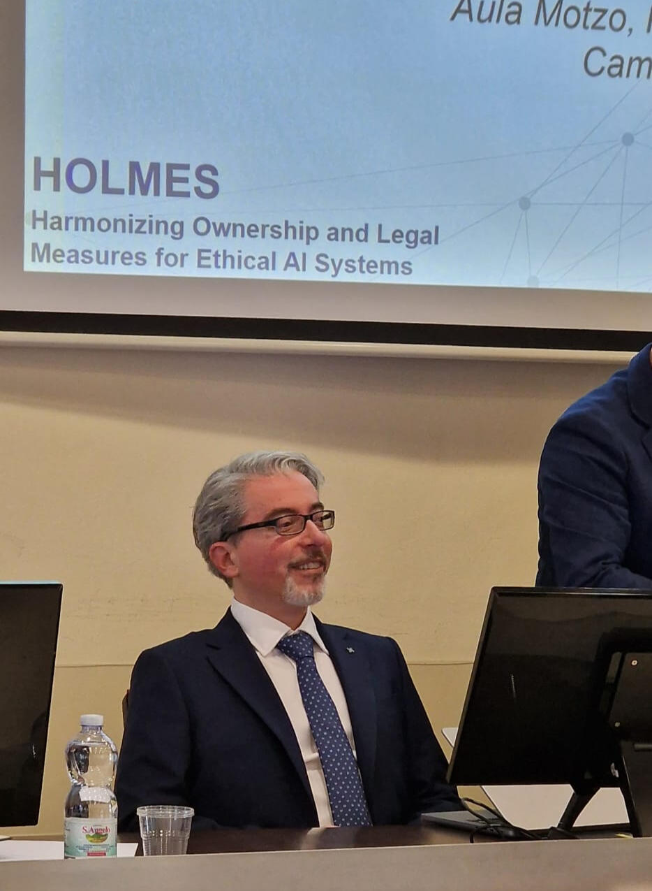 Simone Dongu presenting Scientific Research on Generative AI at the HOLMES conference at UNICA, Cagliari 2025