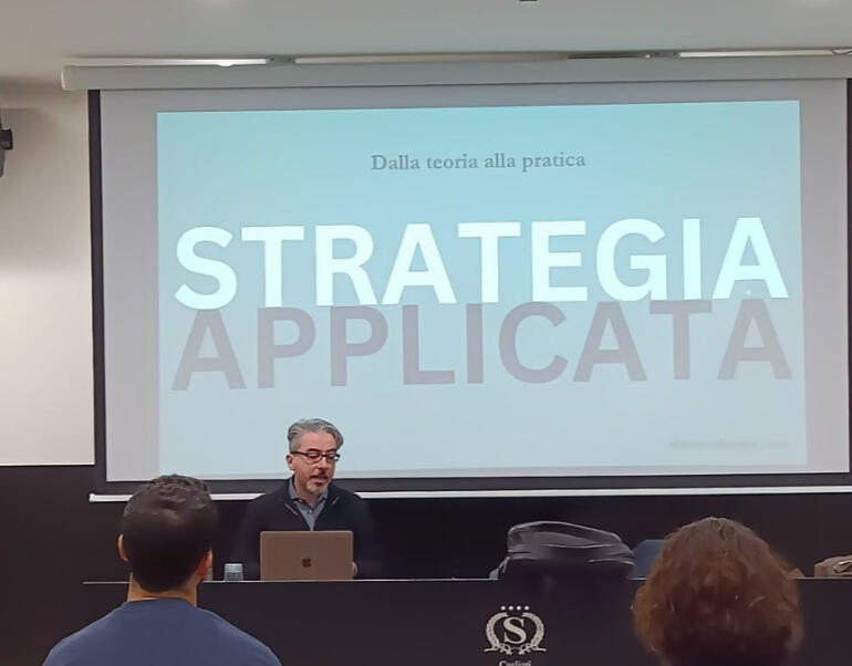 Simone Dongu teaching Applied Strategy & Consumer Intelligence in private conferences for the hospitality industry Simone Dongu teaching Applied Strategy & Consumer Intelligence in private conferences for the hospitality industry